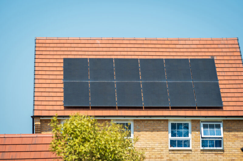 Solar panels on a residential roof in the UK.