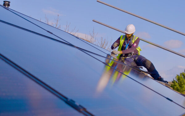MCS certified installer installing solar panels on roof