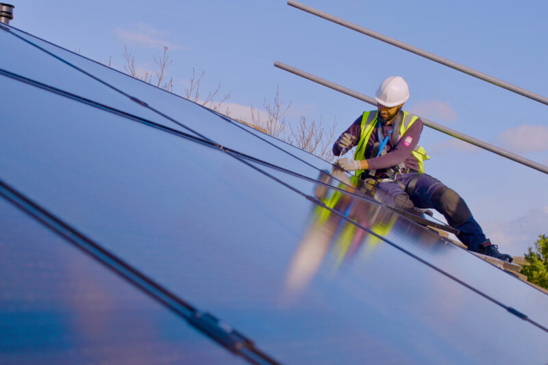 MCS certified installer installing solar panels on roof