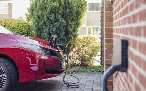 EV car charging outside a home in uk.